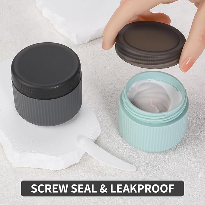 ME.FAN Travel Containers for Toiletries, TSA Approved 2 oz Silicone Cream Jars, Leak-proof Journey Containers, Trip Accessories with Lid for Cosmetic Face Hand Body Cream 4 Pack Black Lid Grey